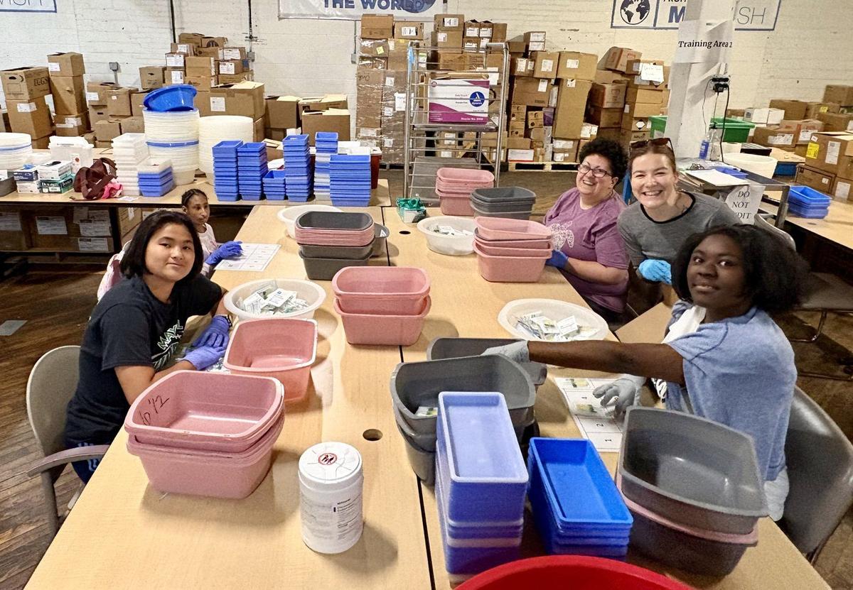 Members volunteering at MedWish MedWorks